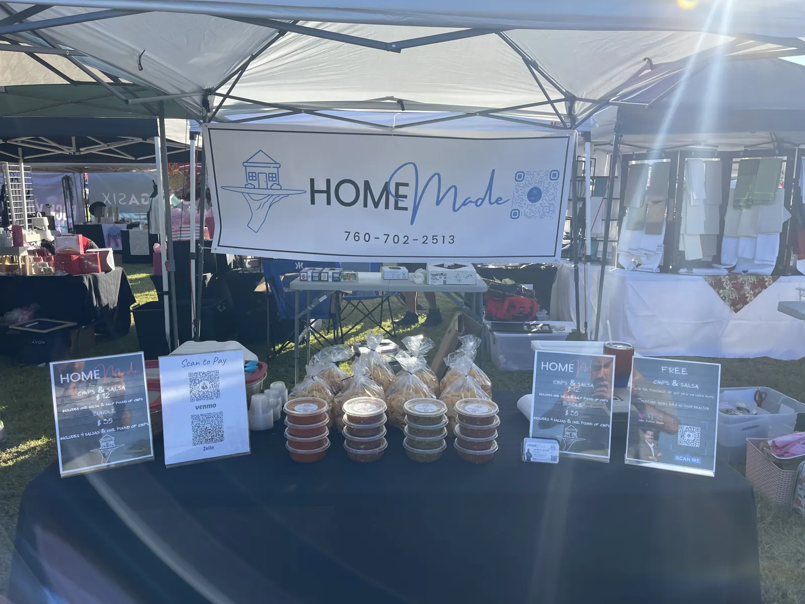 The HOMEmade booth at a sunny outdoor pop-up