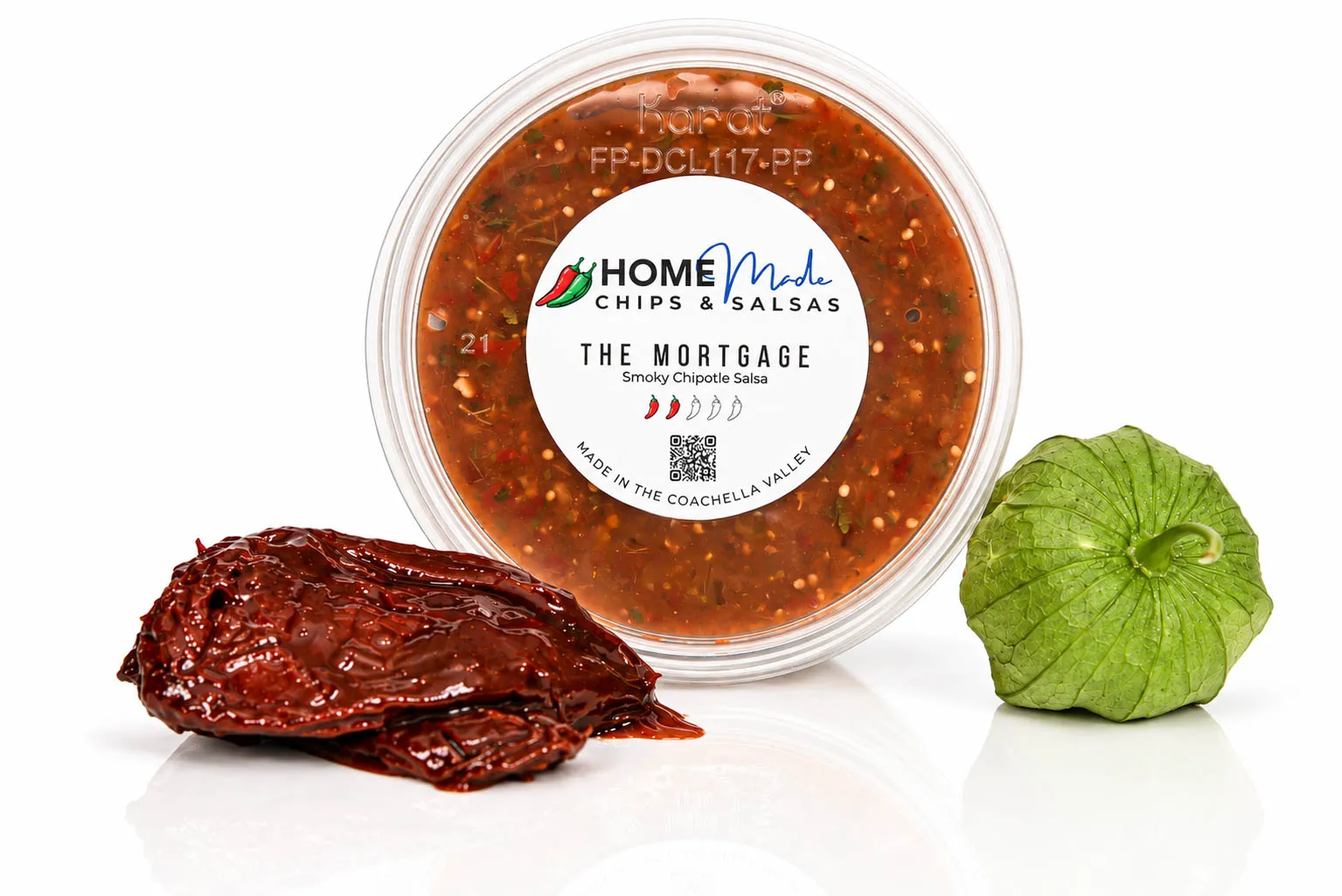 A tub of The Mortgage salsa with its fresh ingredients